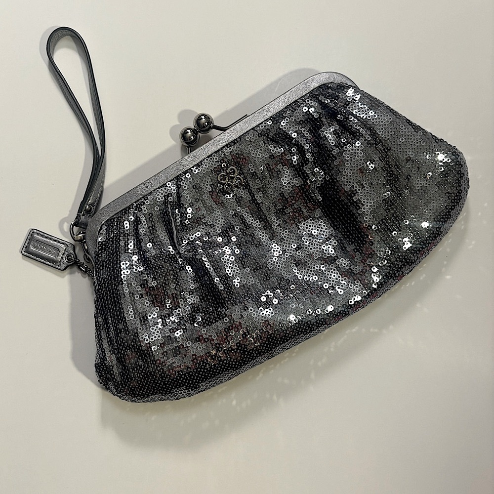 COACH Silver Sequin Wristlet with lavender interior Stunning shine!